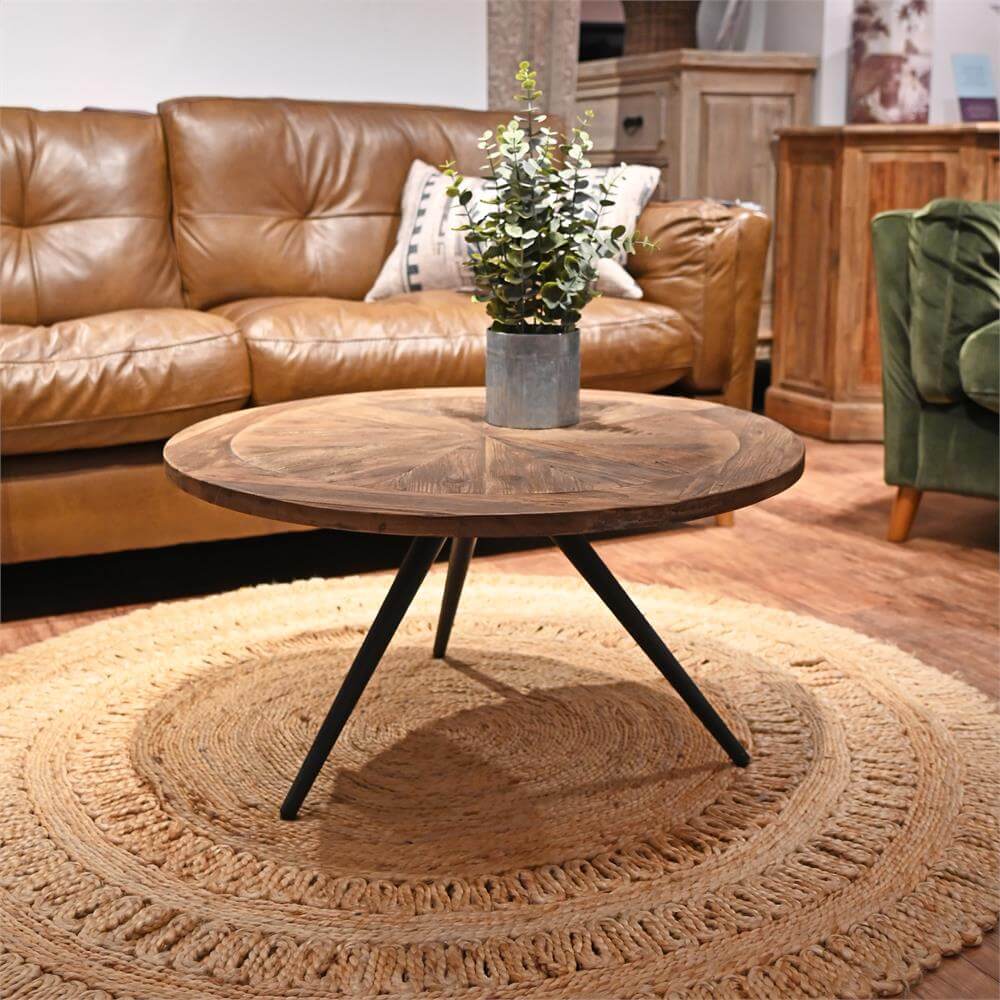 Parquet round store coffee table